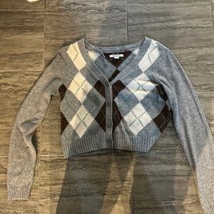 cropped grey, maroon, and white sweater